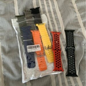 8 Silicone Apple Watch Bands 44MM. 6 brand new and 2 pre own. Multiple colors.